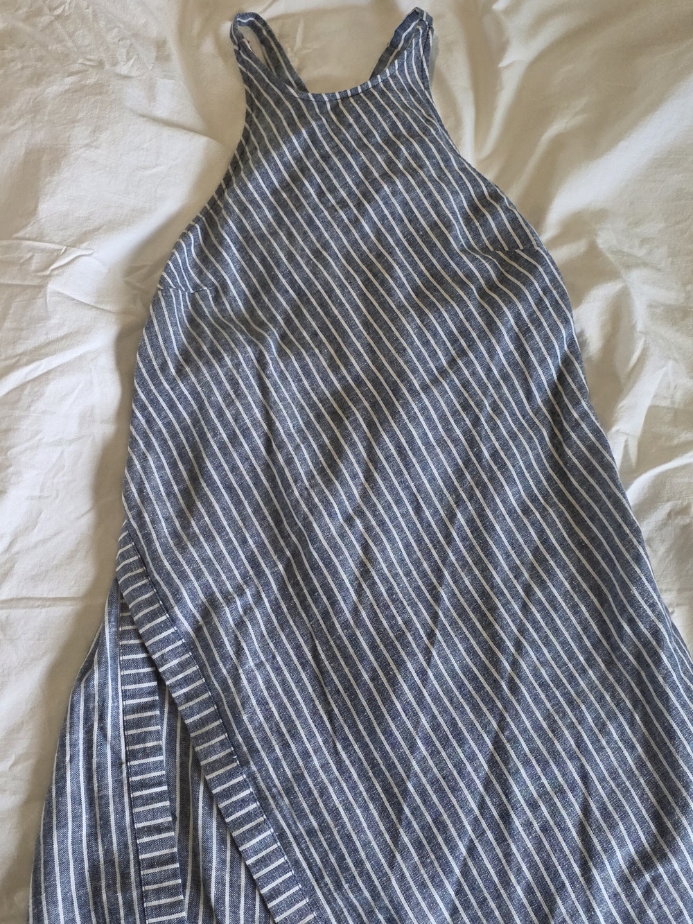 Free People blue and white striped halter dress features an asymmetrical wrap